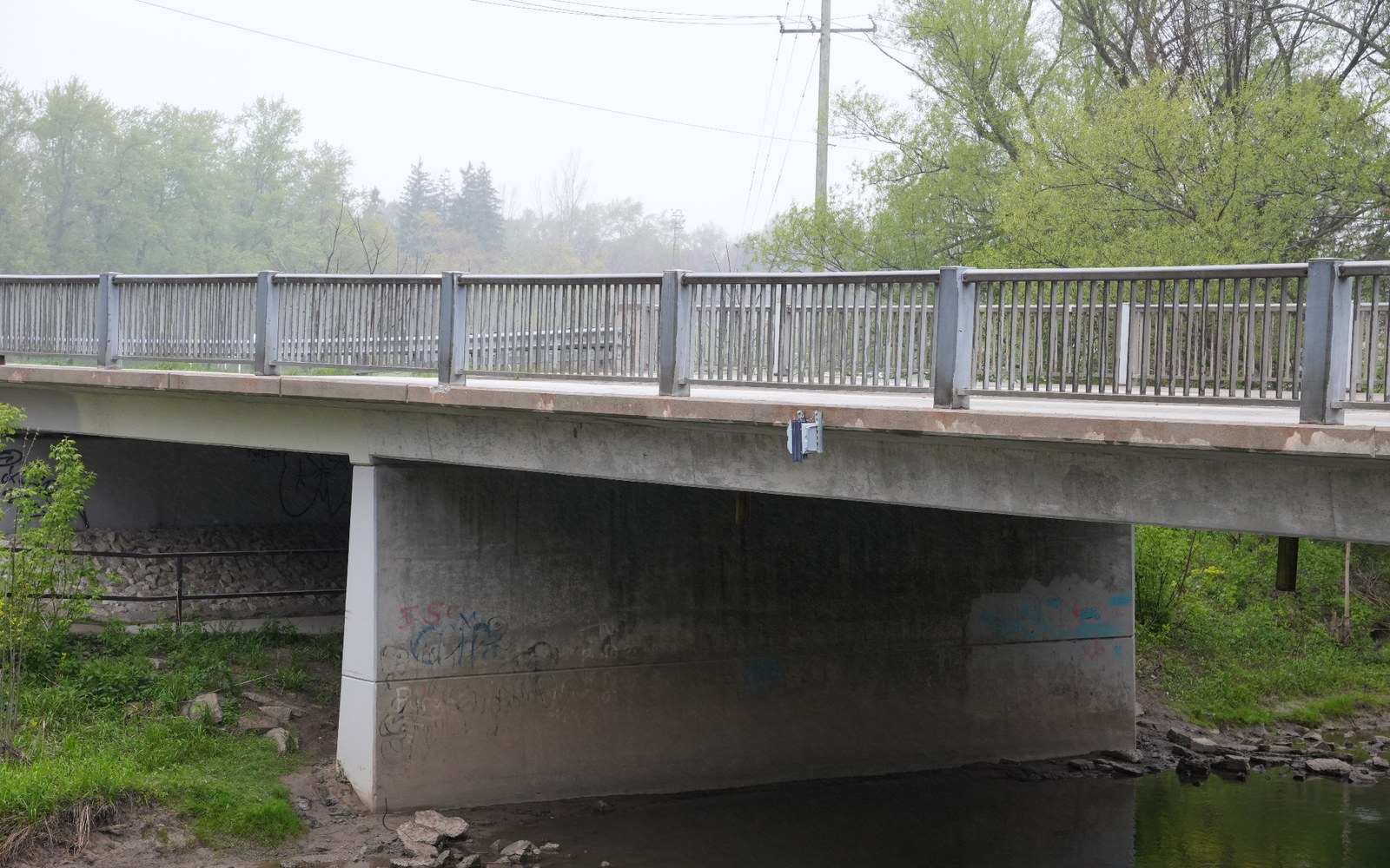 Radiant Aerial field monitoring installation mounted beneath a bridge